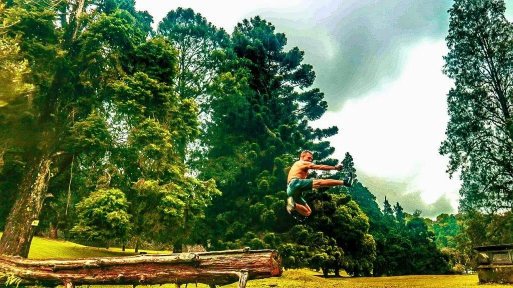 me jumping off a tree branch